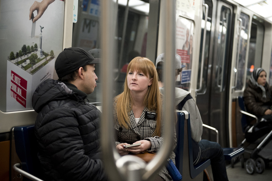 Sister Landeen approaching a stranger in the Metro.